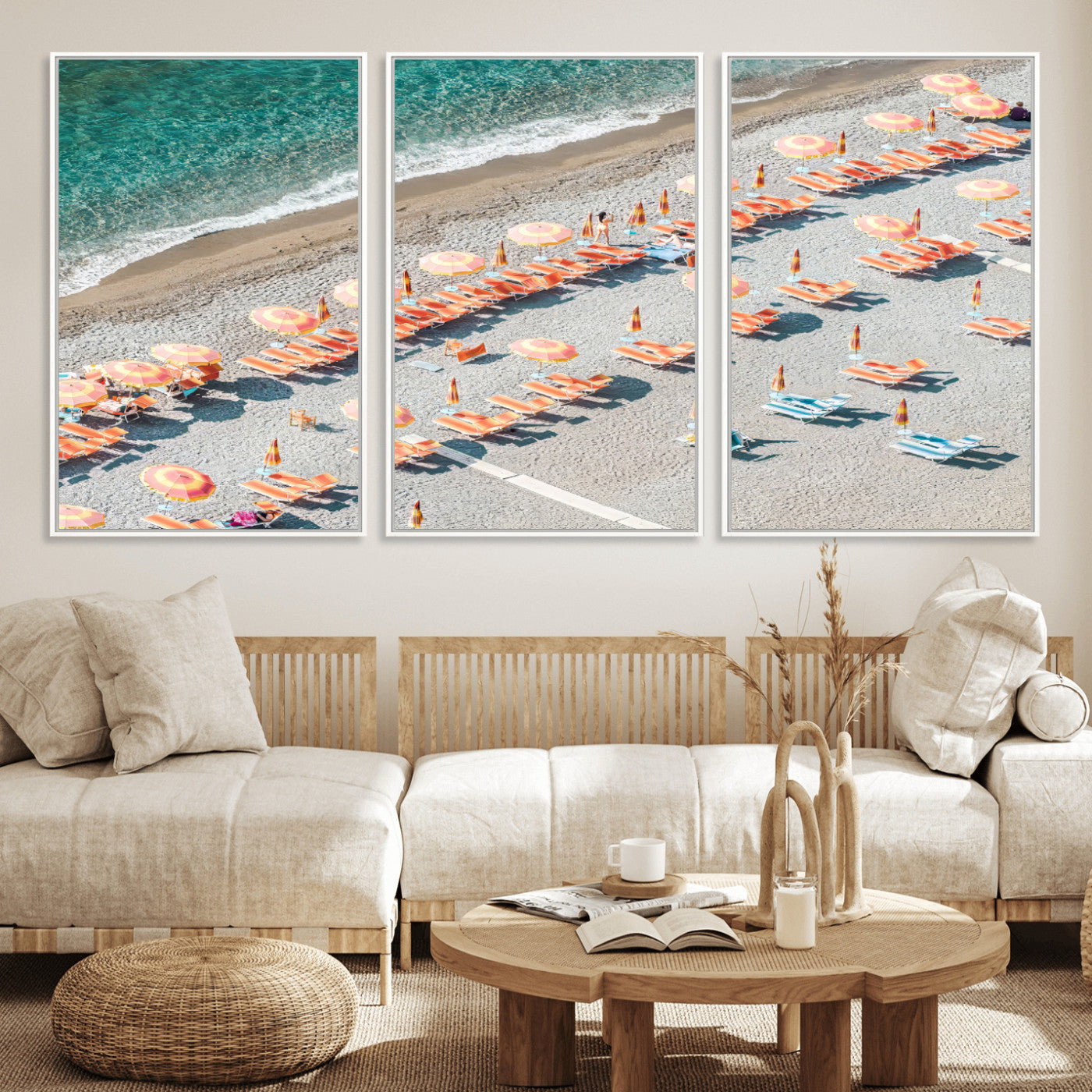 Framed canvas of colorful umbrellas and chairs on a Mediterranean beach, perfect for retro coastal or summer-themed home decor.