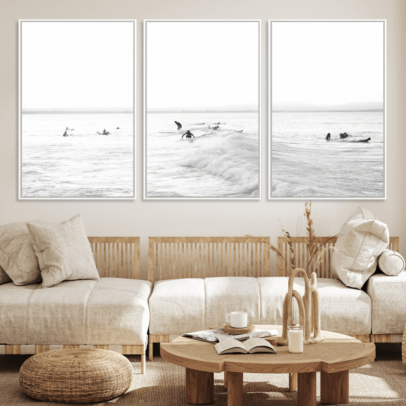 Monochrome photo of surfers riding and waiting on ocean waves, ideal for surf-themed or coastal energy wall decor.