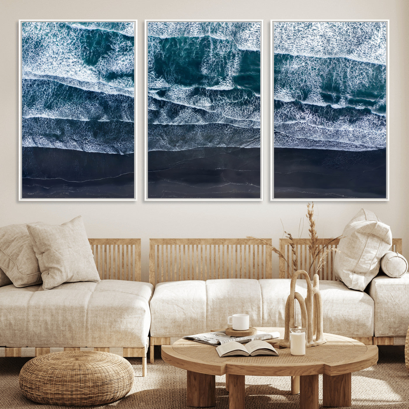 Canvas of aerial ocean waves crashing onto a black sand beach in moody tones, ideal for modern coastal or minimalist home decor.