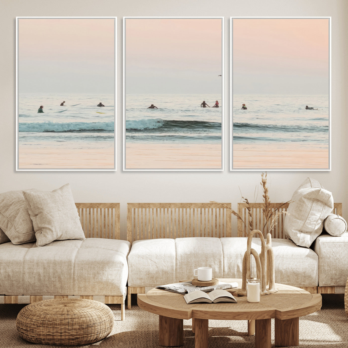 Dreamy photo of surfers waiting on soft pastel waves under a pink sunset sky, ideal for soft coastal minimalist or serene ocean-themed home decor.