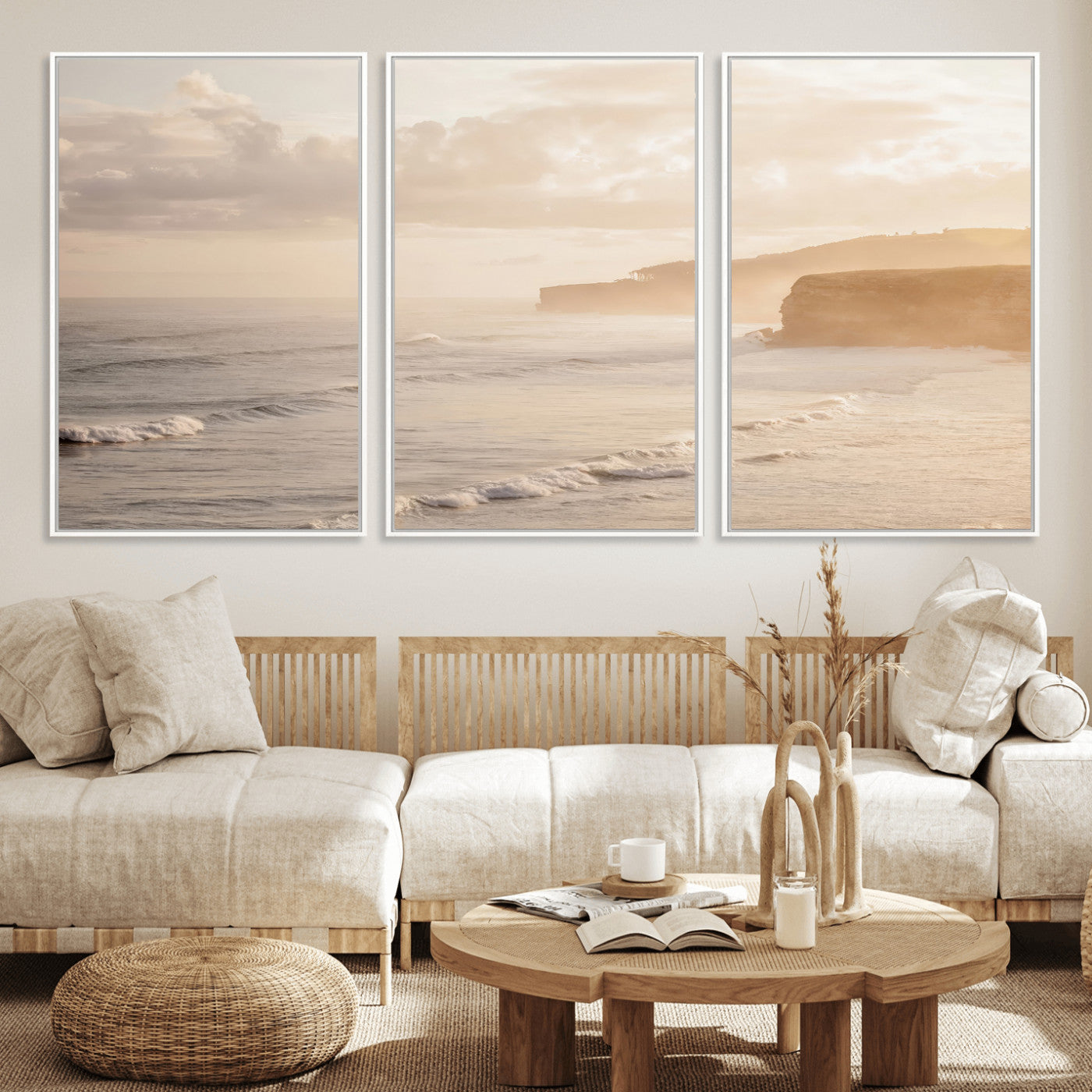Golden hour seascape with misty cliffs and gentle waves rolling towards the shore, capturing a tranquil and warm coastal atmosphere.