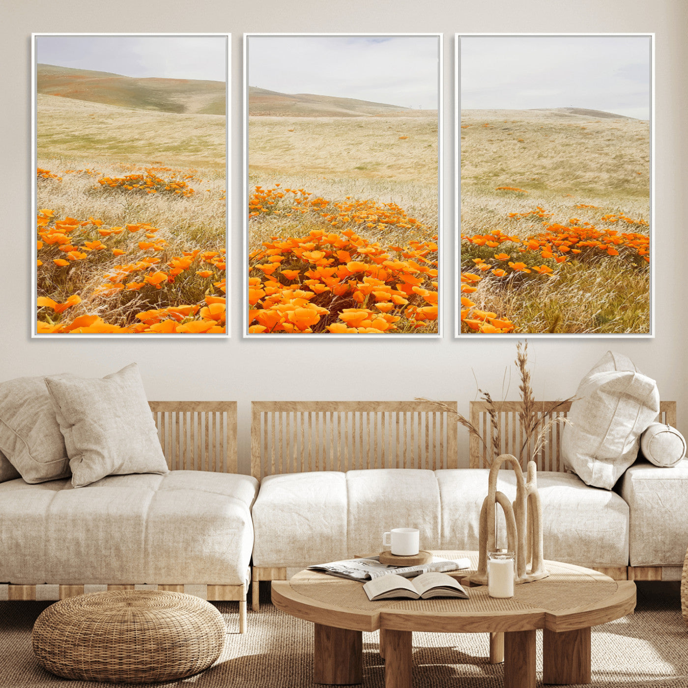 A golden field with vibrant orange poppies blooming across rolling hills under a soft, sunlit sky, creating a warm and rustic landscape.