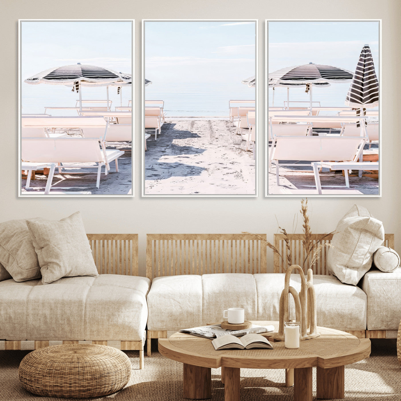 A serene minimalist beach scene featuring striped umbrellas, soft pastel sand, and an elegant lounge setup, creating a tranquil and stylish coastal retreat.