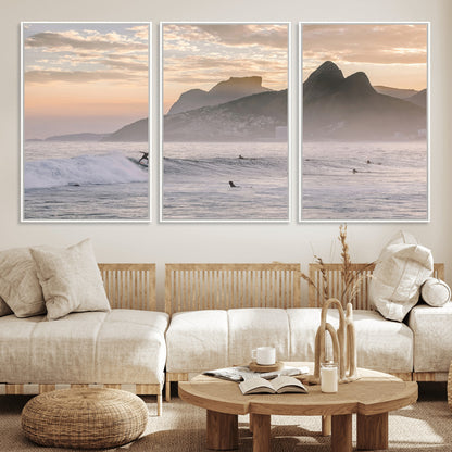 A surfer rides a golden hour wave near misty coastal mountains, surrounded by fellow surfers, capturing the spirit of a coastal adventure.