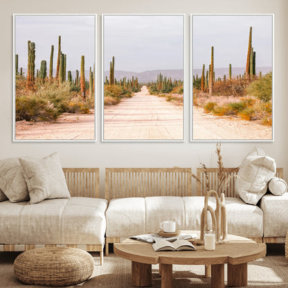 A desert road lined with saguaro cacti under a golden sky, creating a warm southwestern feel, perfect for boho or rustic decor.