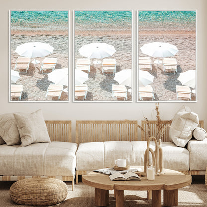 A bright beach scene with white umbrellas, pastel sand, and turquoise waters, creating a tranquil coastal vibe, perfect for beach house or summer decor.