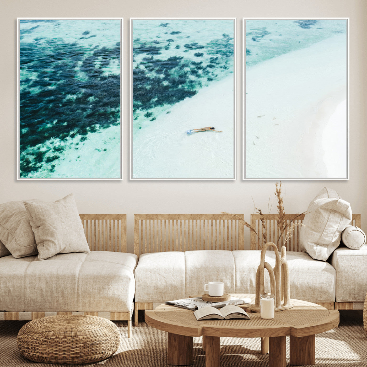 Canvas featuring an aerial view of a swimmer in shallow turquoise waters with coral patterns, ideal for tropical coastal home decor.