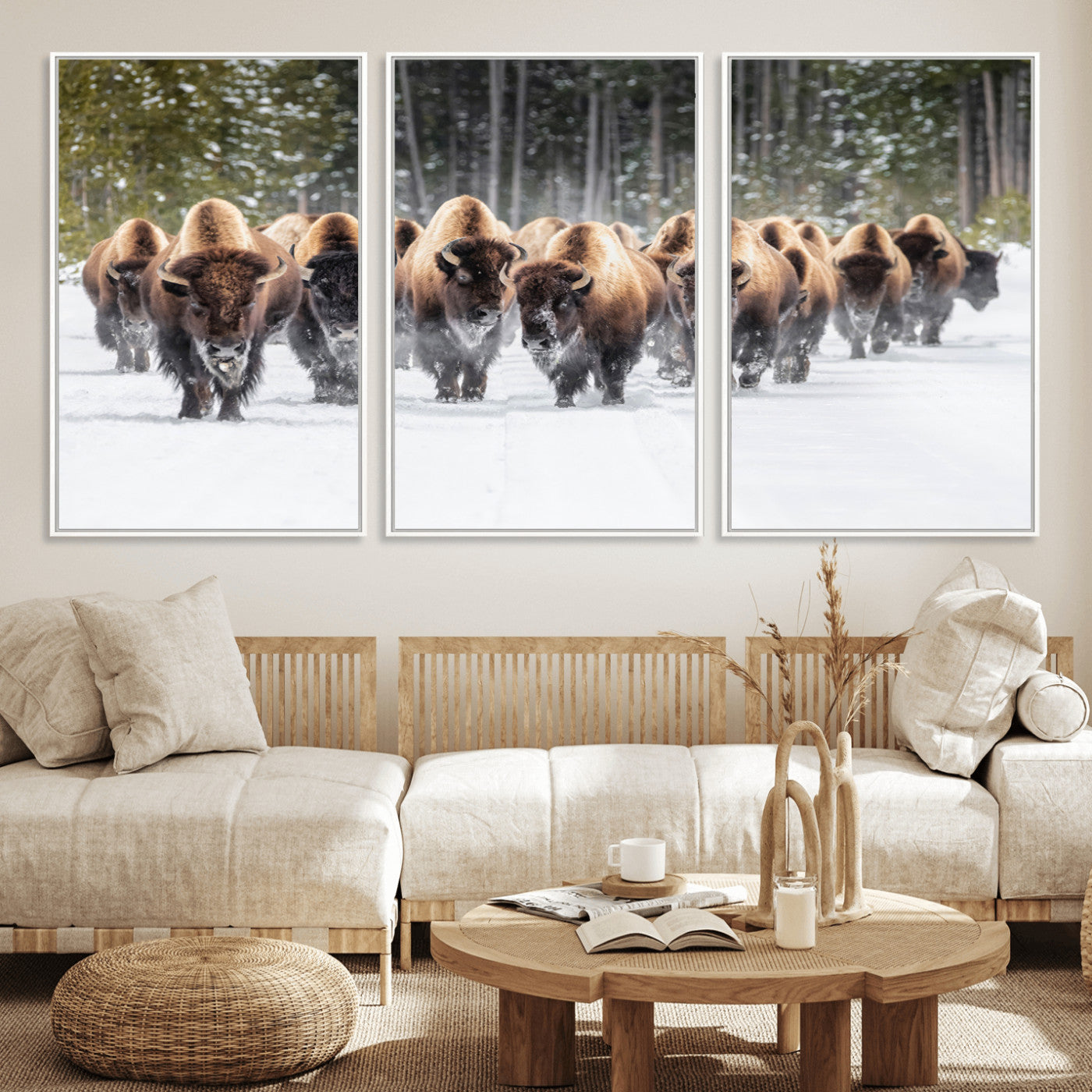 A herd of American bisons walking through a snowy forest path, perfect for rustic cabin or Western-themed wall decor.