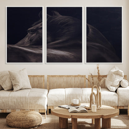 Close-up of a black horse with dramatic lighting on a dark background, perfect for rustic or masculine home decor.