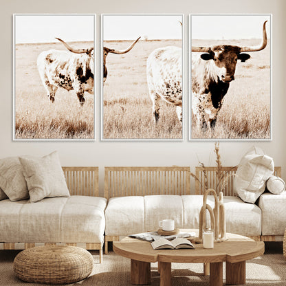 Two Texas longhorn cows standing in a sepia-toned pasture, evoking rustic charm perfect for farmhouse or western country interiors. (