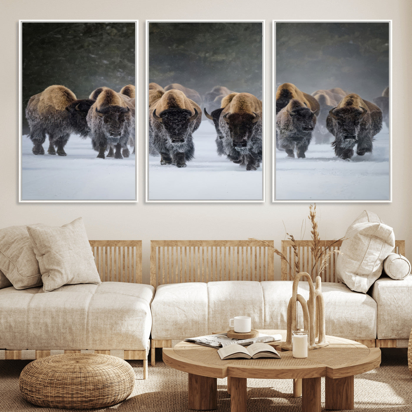 A herd of American bisons walking through deep snow in a forest, evoking a powerful rustic wilderness mood for western-style interiors.
