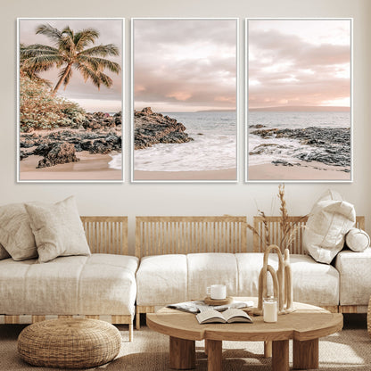 A peaceful beach scene with a palm tree and rocks, soft waves washing onto the shore under a soft pastel sky at sunset.