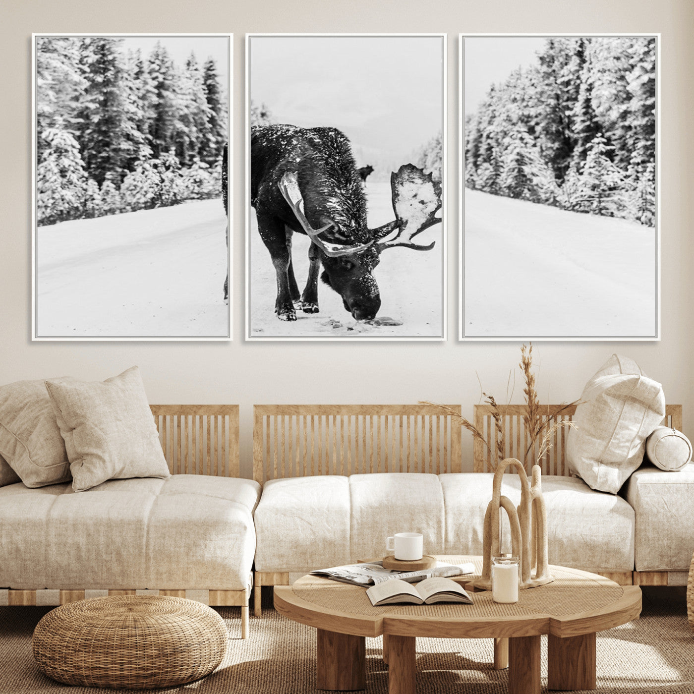 A majestic moose grazing in the snow-covered wilderness, surrounded by snow-covered trees, creating a peaceful winter scene.