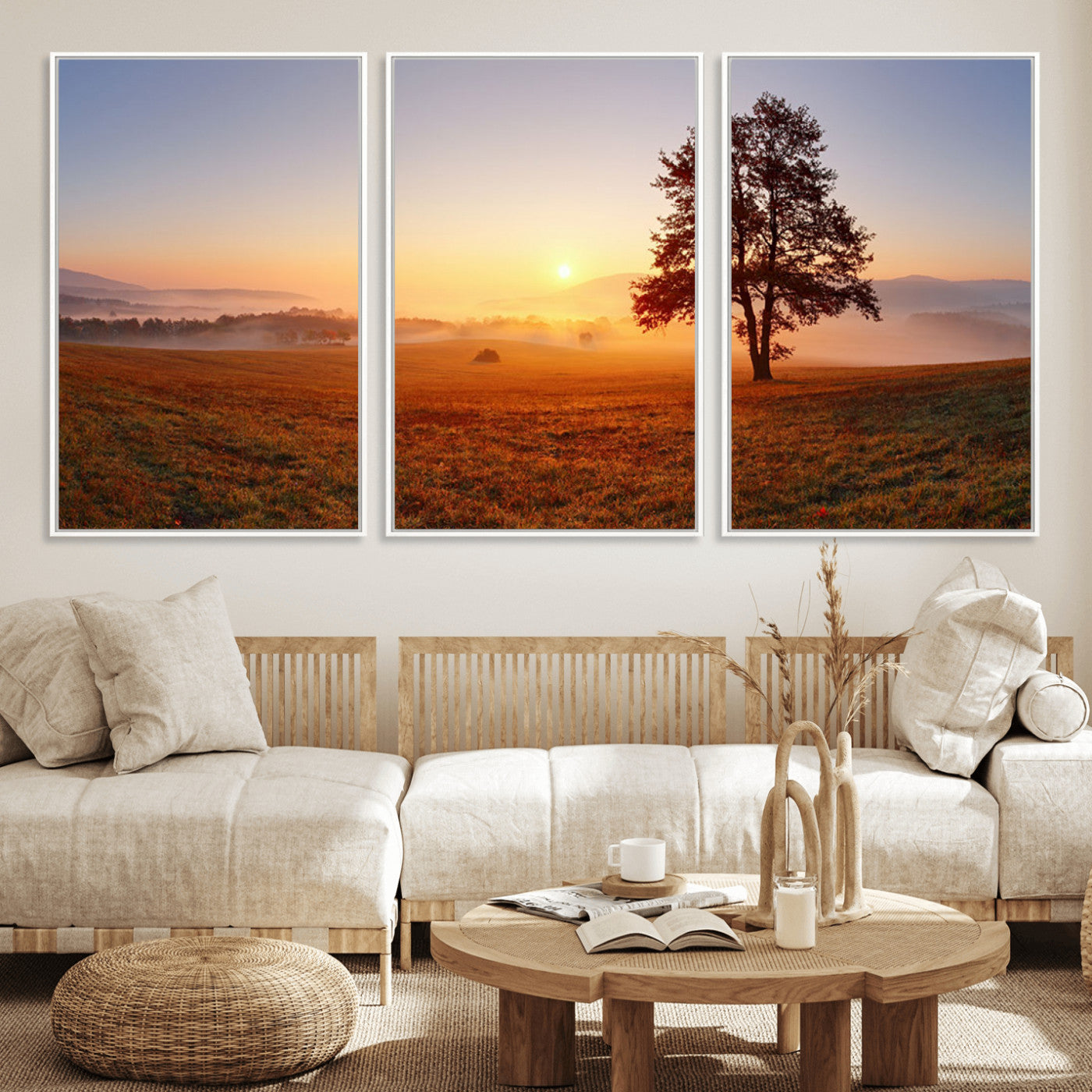 A tranquil landscape at sunrise with a mist-covered field and a lone tree, creating a peaceful and natural atmosphere.