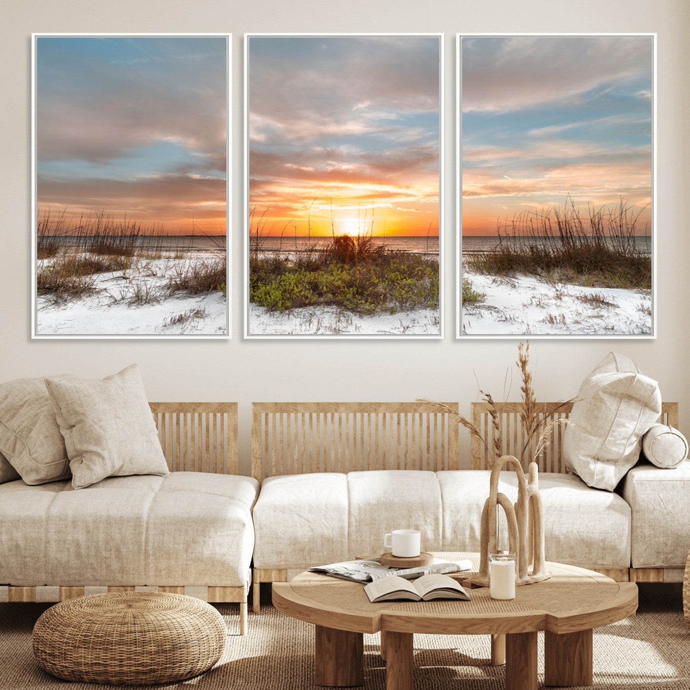 A tranquil beach scene featuring golden sunset hues over the water, with grasses in the foreground and a peaceful, serene atmosphere.