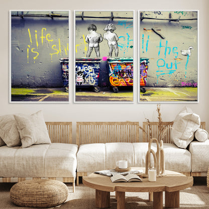 Graffiti-style canvas art with bold text and two naked figures over urban dumpsters, ideal for edgy or street-style decor.
