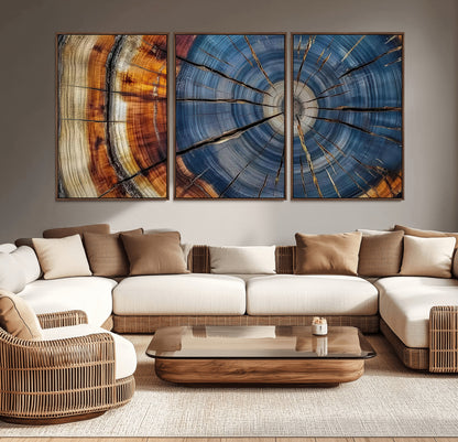 A stunning close-up view of a tree trunk, showcasing the intricate growth rings in a vibrant mix of warm browns, cool blues, and hints of natural texture.