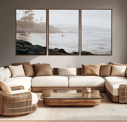 Framed canvas of a surfer in misty coastal tones at a foggy California beach, ideal for minimalist coastal beach or serene ocean-themed decor.