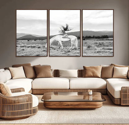 Black and white photo of a woman on a white horse in moody tones, ideal for Western Boho or modern rustic-style home decor.