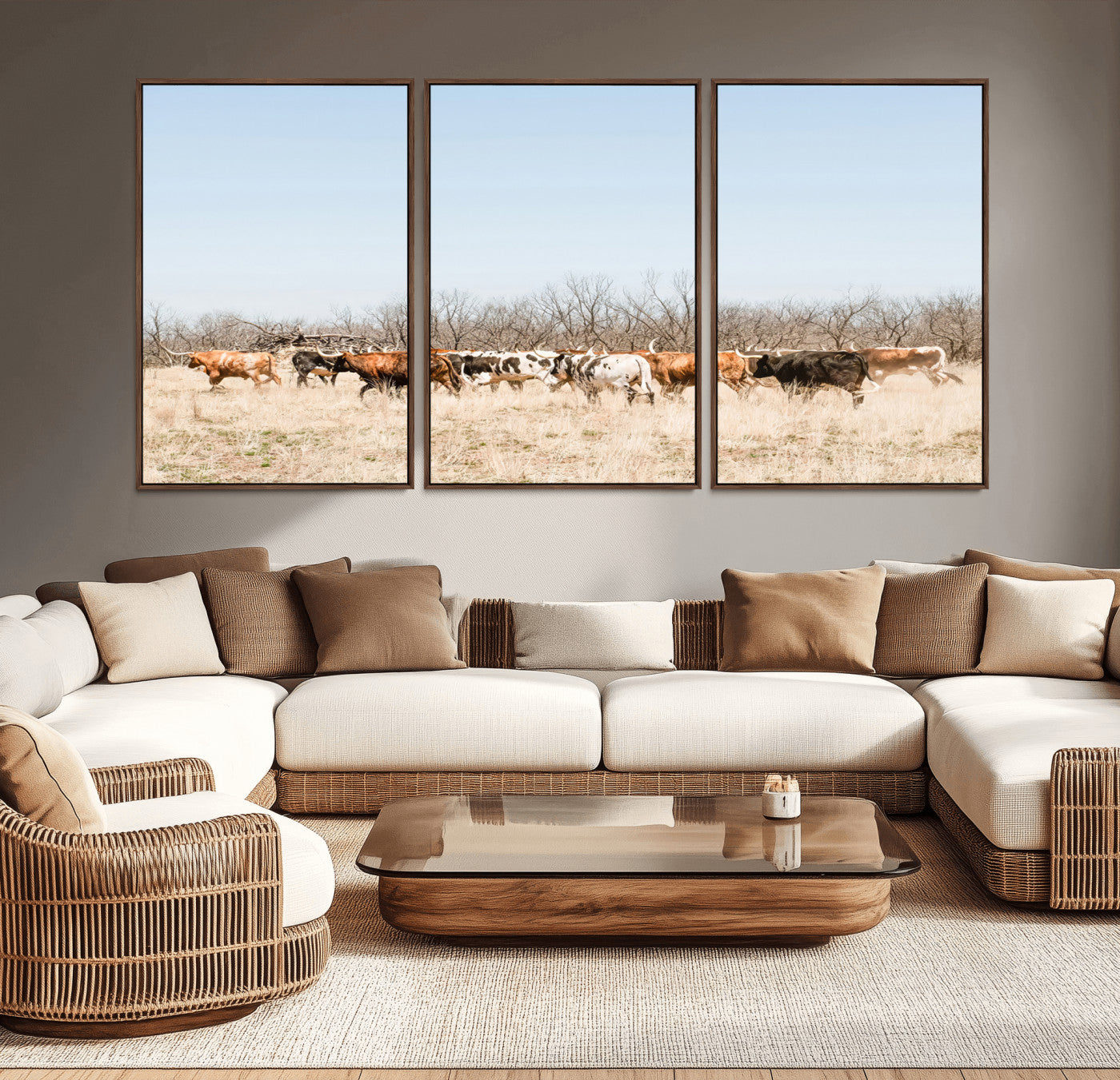 Framed wall art of Texas longhorn cattle walking through a dry, neutral-toned prairie, perfect for rustic farmhouse or western-themed home decor.