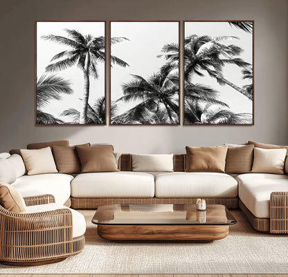 Black and white canvas of tall palm trees in moody tones, perfect for modern tropical minimalist or coastal-style home decor.