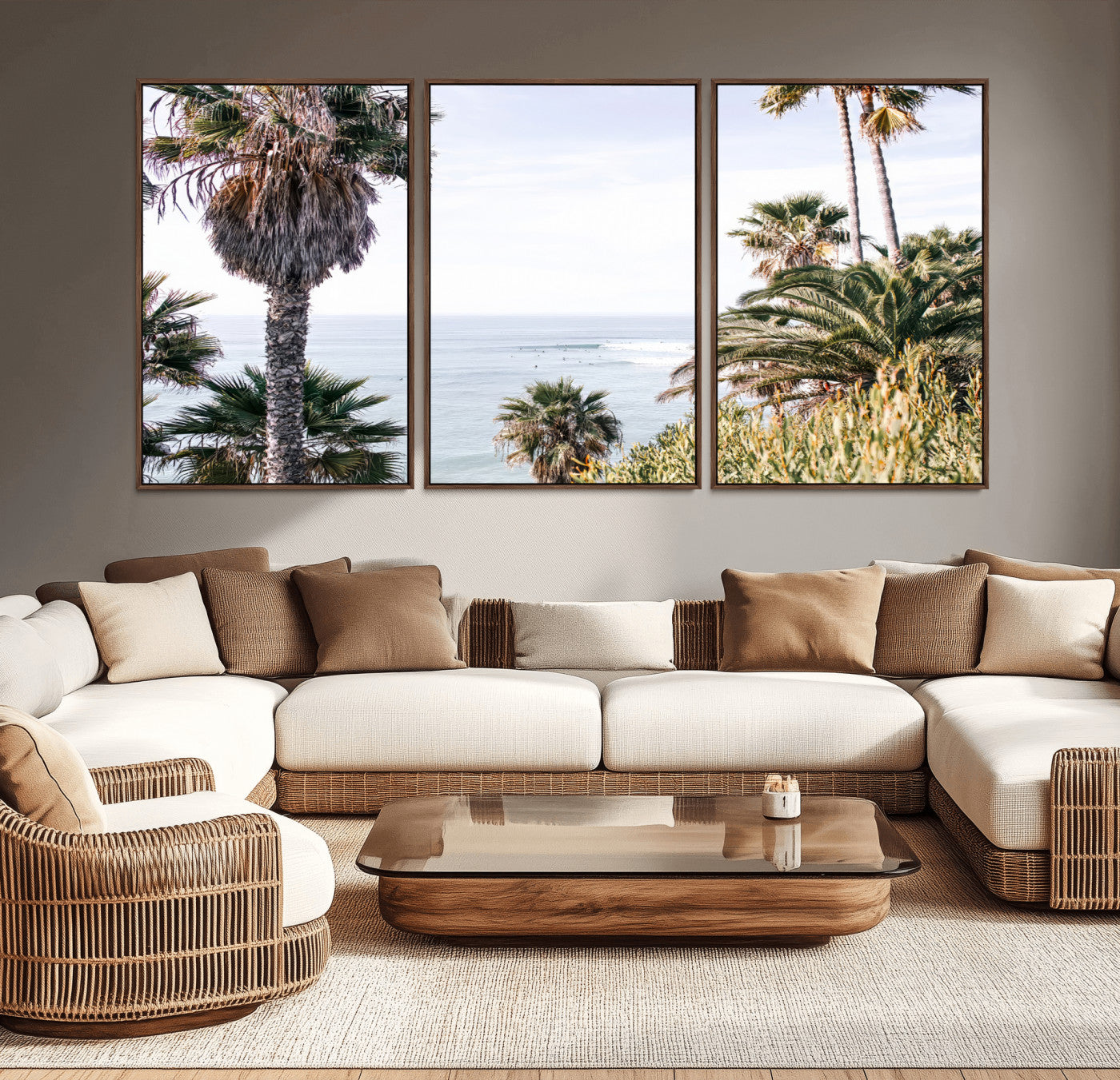 Scenic coastal view with tall palm trees overlooking a calm ocean, soft blue waves, and surfers in the distance, creating a peaceful tropical vibe.