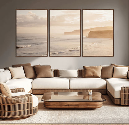 Golden hour seascape with misty cliffs and gentle waves rolling towards the shore, capturing a tranquil and warm coastal atmosphere.