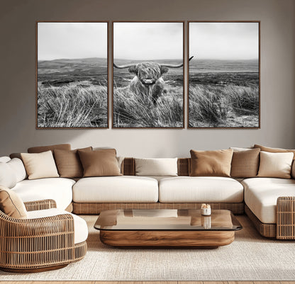 A black and white portrait of a Highland cow in a foggy Scottish countryside, capturing a rustic aesthetic and tranquil farm escape.
