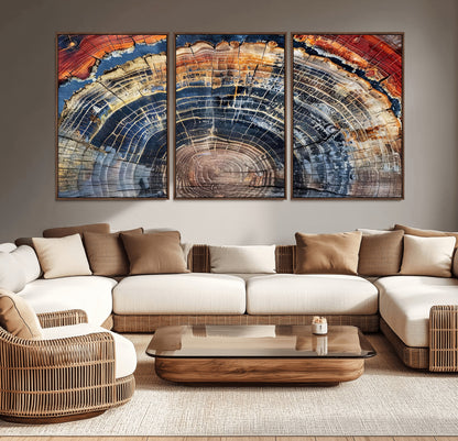 Vibrant tree ring with orange, brown, and blue tones in abstract detail, perfect for rustic or boho-inspired wall decor.