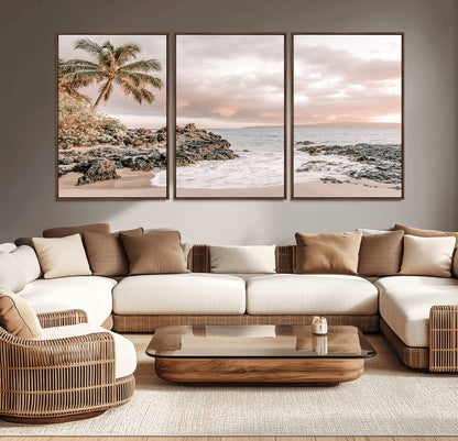A peaceful beach scene with a palm tree and rocks, soft waves washing onto the shore under a soft pastel sky at sunset.