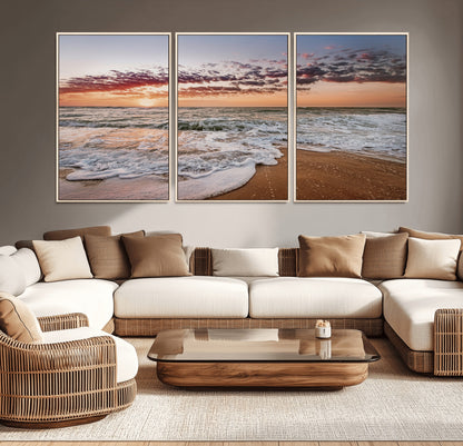 Canvas of a sunset over a foamy ocean shore with warm light and gentle waves, ideal for coastal or beach-themed home decor.