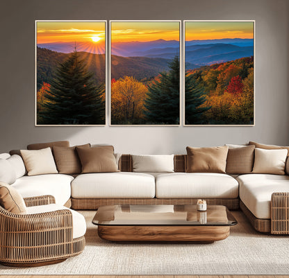 Vibrant sunset over autumn mountains with colorful trees and warm light, ideal for nature lovers or cabin-style wall decor.