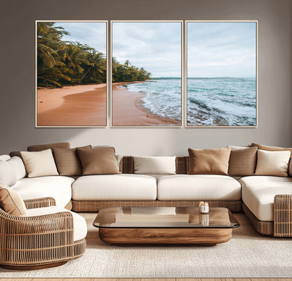 Framed canvas of a tropical beach with palm trees and soft waves, ideal for coastal escape or serene nature-inspired home decor.