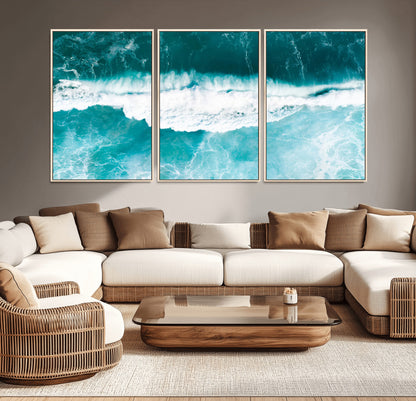 Aerial view of turquoise ocean waves crashing with white foam, perfect for tropical coastal or modern beach-style home decor.