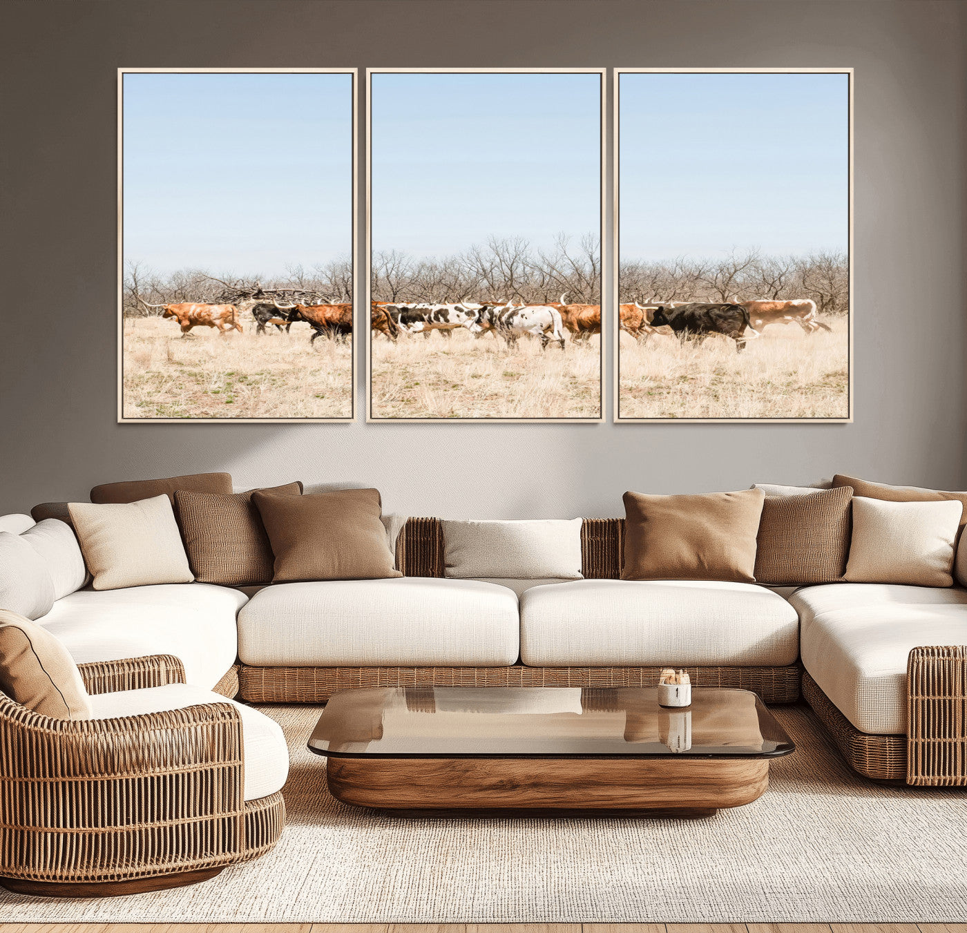 Framed wall art of Texas longhorn cattle walking through a dry, neutral-toned prairie, perfect for rustic farmhouse or western-themed home decor.