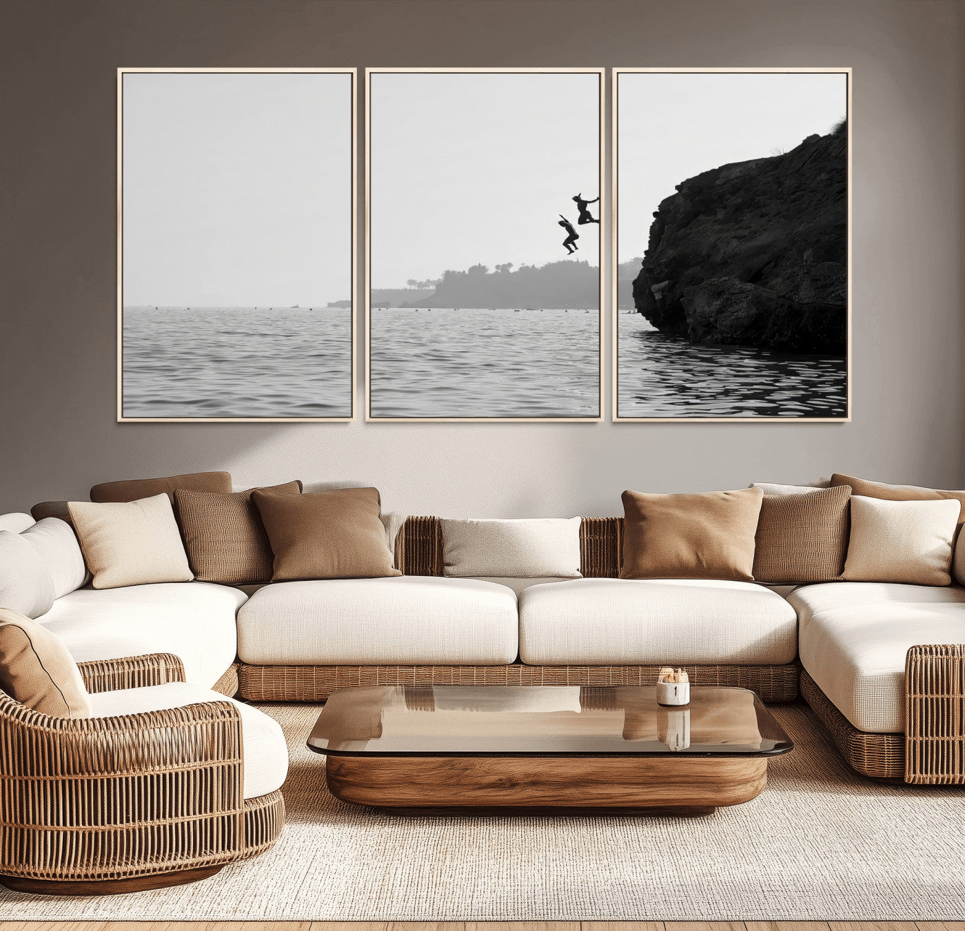 Black and white canvas of two figures cliff jumping into the sea, captured with moody tones, ideal for modern coastal or adventure-themed home decor.   2/2