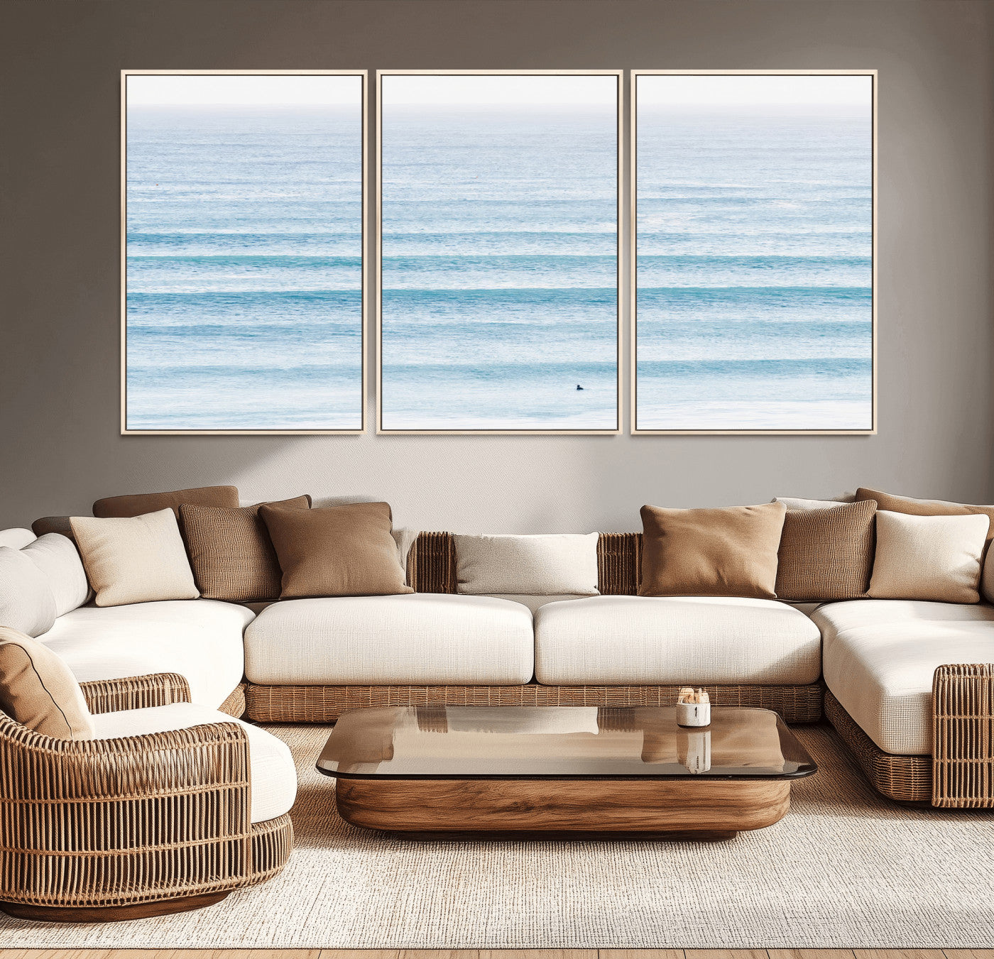 Minimalist ocean view with soft blue waves and a lone surfer, creating a serene and airy coastal aesthetic, perfect for tranquil home decor.