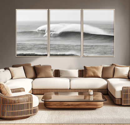 A dramatic black and white ocean wave crashing with immense force, capturing the raw power and movement of the sea in a bold seascape.