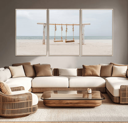 A rustic wooden beach swing stands on a serene sandy shore with an ocean horizon in the background, creating a tranquil and dreamy coastal escape.
