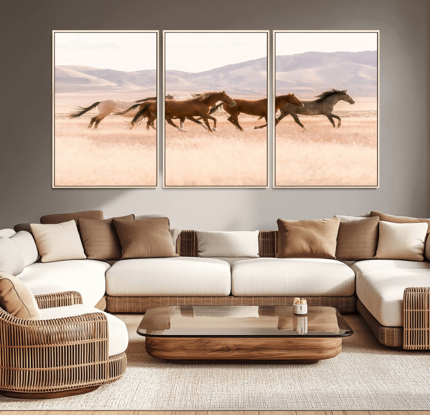 A herd of wild horses galloping through a sunlit desert plain with mountains in the background, perfect for rustic or western-themed wall decor.