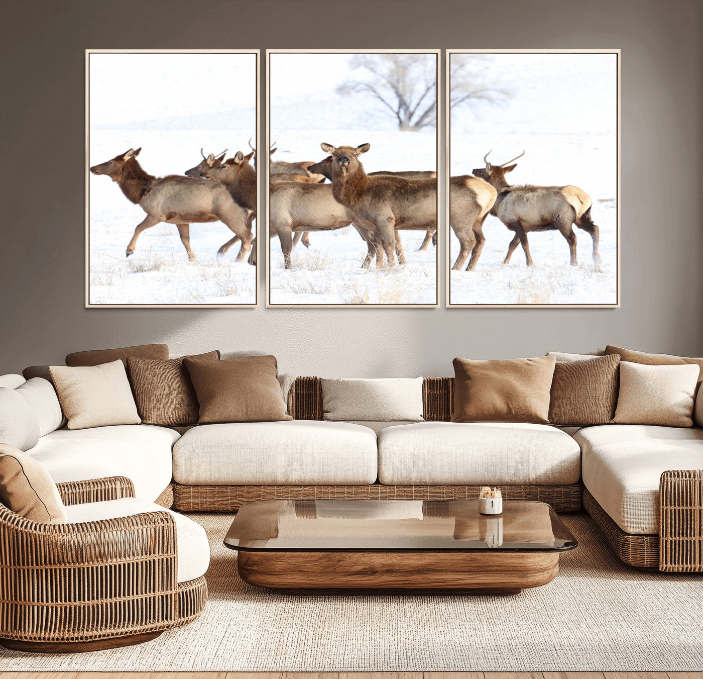 A group of elk standing on snowy terrain with a tree in the background, perfect for rustic or lodge-style winter wall decor.