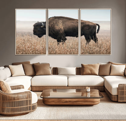 A lone bison stands in a vast prairie under a soft sky, evoking freedom and rustic charm for western or farmhouse inspired interiors.
