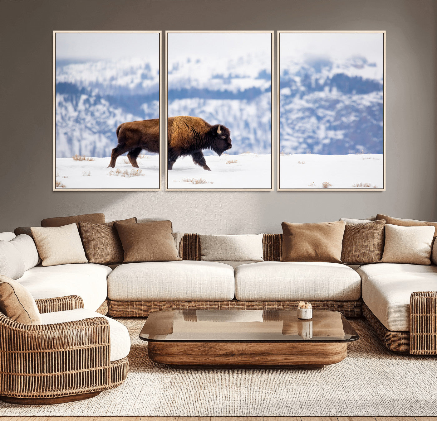 A lone bison walks across snowy ground with blue-toned mountain range behind, ideal for rustic or western farmhouse interiors.