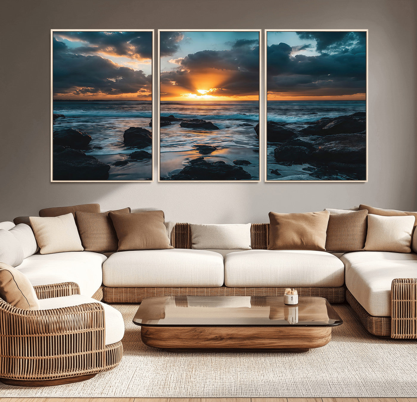 An awe-inspiring sunset over the ocean with rays of light piercing through dramatic clouds, creating a beautiful seascape with rocks in the foreground.
