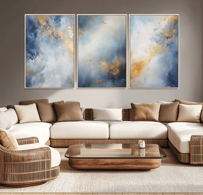Abstract canvas art in soft blue and gold tones with textured brushstrokes, ideal for elegant or modern neutral decor spaces.