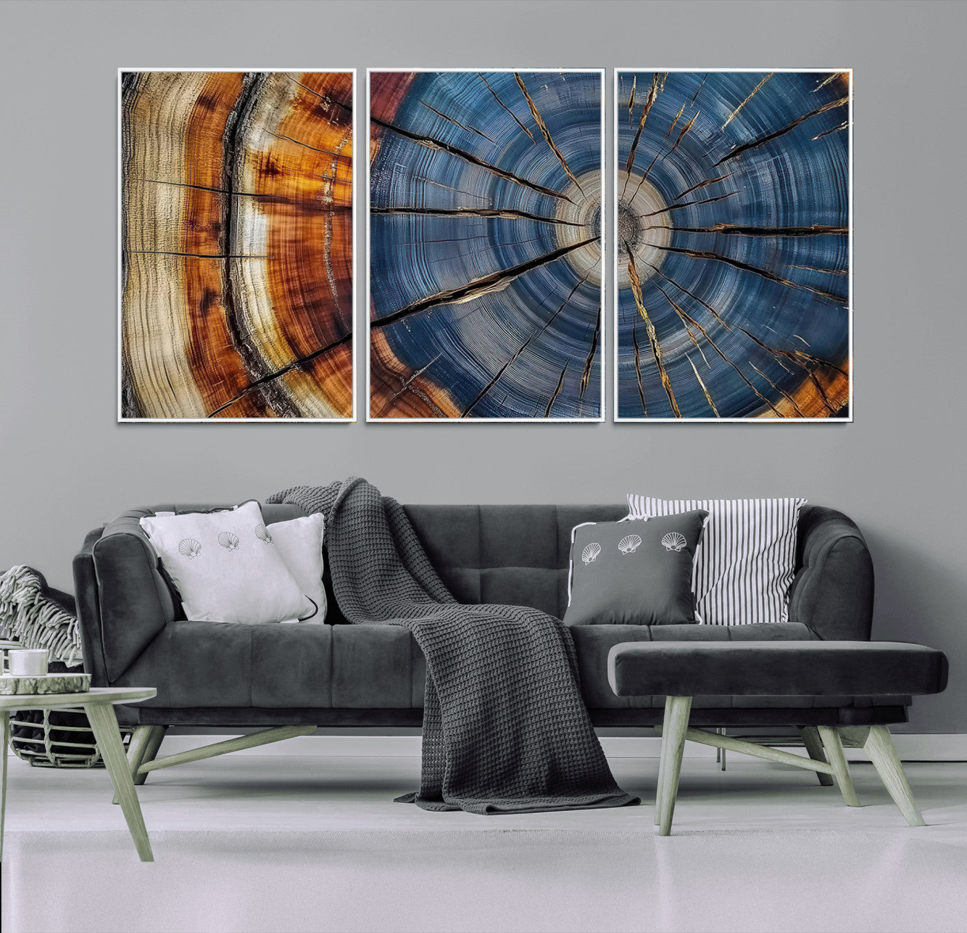 A stunning close-up view of a tree trunk, showcasing the intricate growth rings in a vibrant mix of warm browns, cool blues, and hints of natural texture.