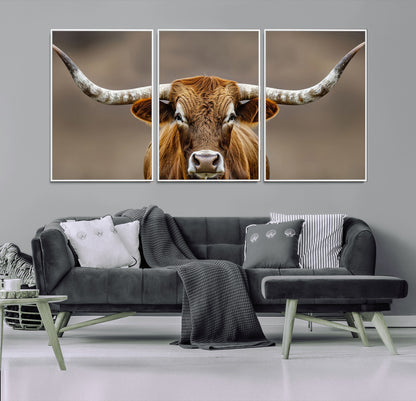 Close-up of a Texas Longhorn with strong curved horns and warm brown tones, perfect for rustic or western-style wall decor.