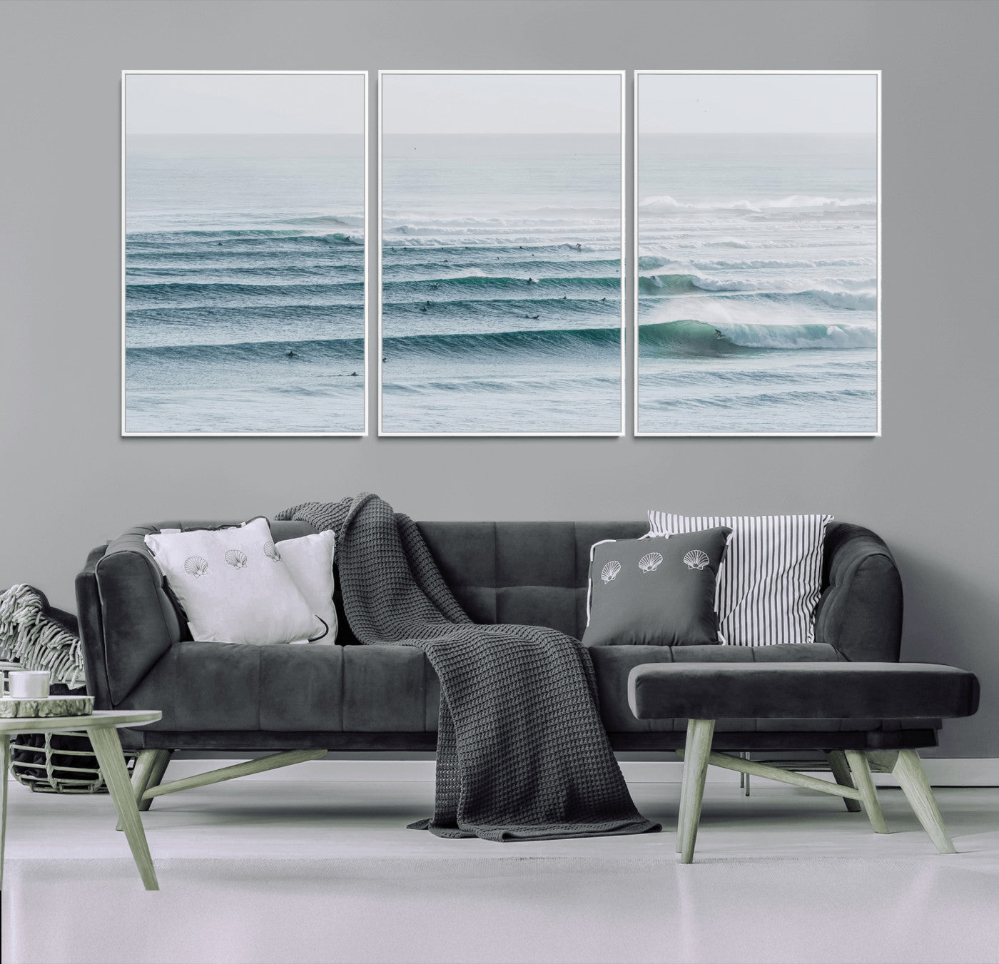High-angle view of surfers lining up across layered ocean waves, ideal for minimal coastal or surf-inspired room decor.
