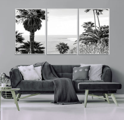 Monochrome canvas of palm trees framing a coastal surf scene, perfect for California-inspired or retro black-and-white beach decor.