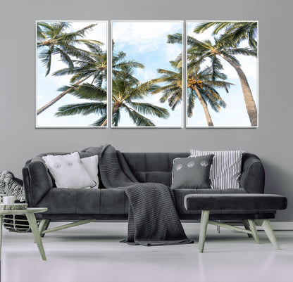 Framed canvas of tall palm trees reaching into a tropical sky, ideal for beach home or relaxed island-inspired wall decor.